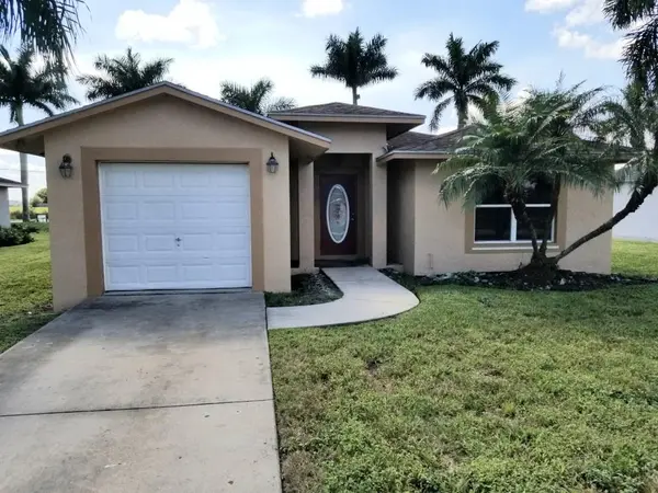 144 Dabou Loop, Belle Glade, FL 33430