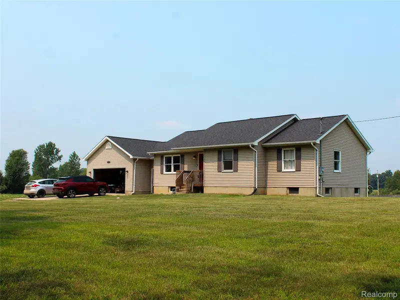 1583 E Lansing RD, Antrim Township, MI 48857