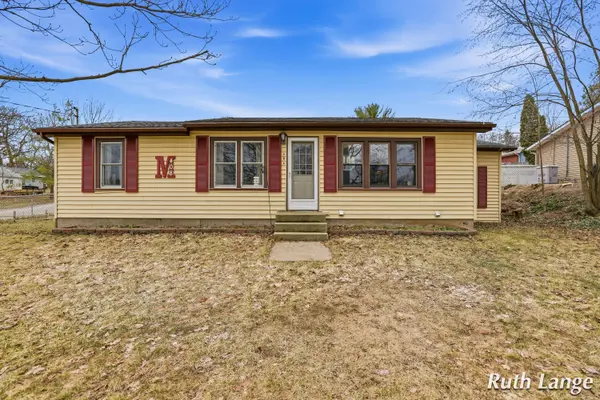 408 Brady ST NW, Alpine Twp, MI 49321