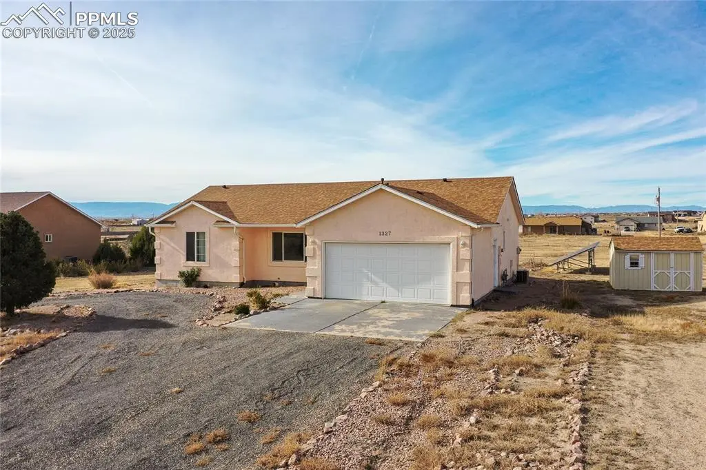 1327 N Blazing Star LN, Pueblo West, CO 81007