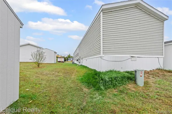 83 Elm AVE, Highland Charter Township, MI 48357