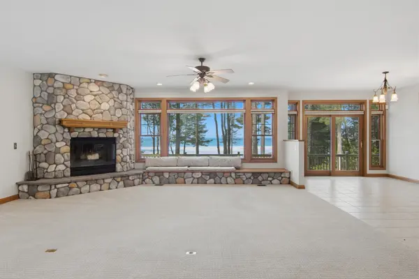 410 Golden Beach DR, Torch Lake Twp, MI 49648