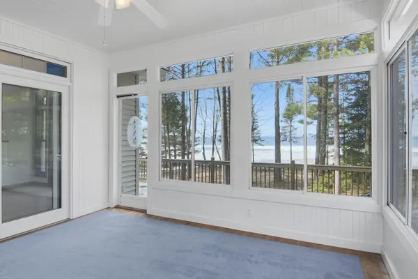 410 Golden Beach DR, Torch Lake Twp, MI 49648