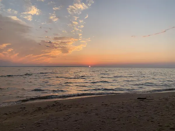 410 Golden Beach DR, Torch Lake Twp, MI 49648