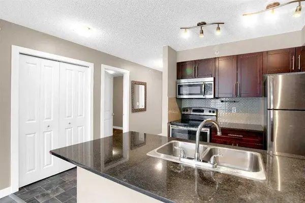 403 Mackenzie WAY SW #9407, Airdrie, AB T4B 3V7