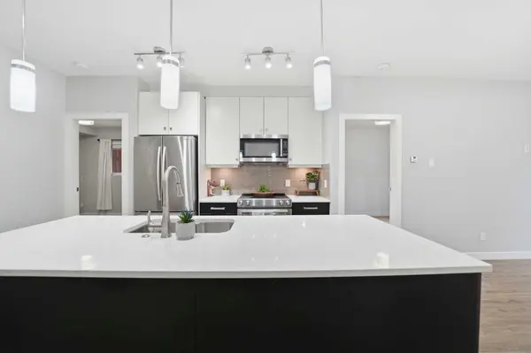 1720 10 ST SW #107, Calgary, AB T2T 3E8