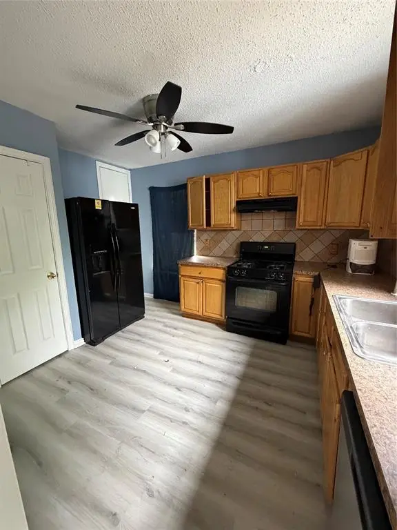 1227 W Avenue Avenue E, Garland, TX 75040