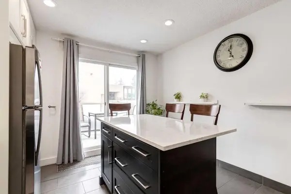 1305 Glenmore TRL SW #104, Calgary, AB T2V 4Y8