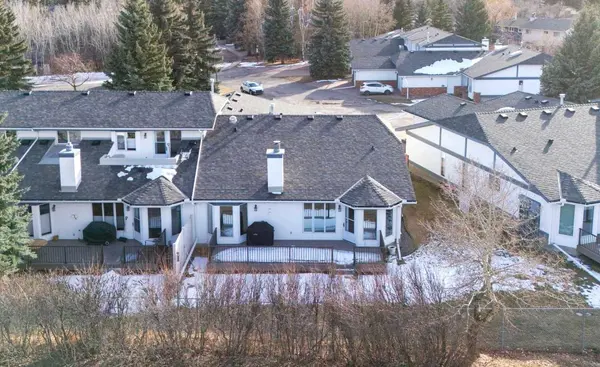 42 Woodmeadow Close SW, Calgary, AB T2W 4L8