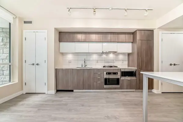 51 Waterfront Mews SW #110, Calgary, AB T2P0X3