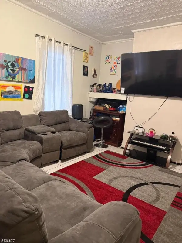 28 Burgess Pl, Passaic City, NJ 07055