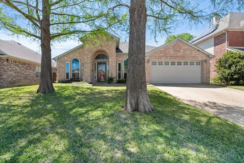 Brick home with mature trees, 1202 Angel Fire Lane