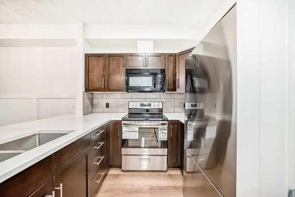22 Panatella RD NW #101, Calgary, AB T3K 0V4