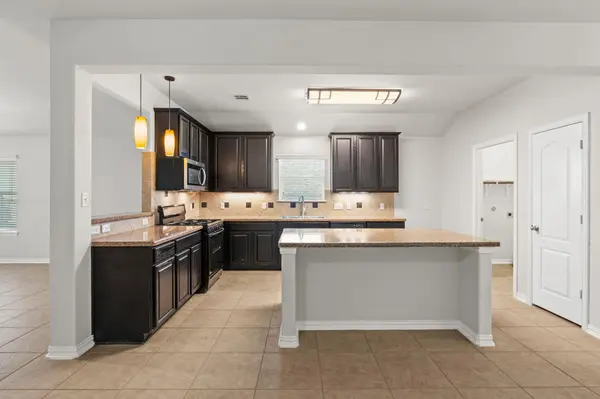 322 Strawberry Blonde DR, Buda, TX 78610