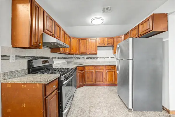 102-42 86th RD, Richmond Hill, NY 11418