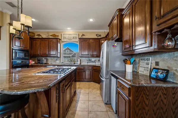 8 Loggerhead, Hitchcock, TX 77563