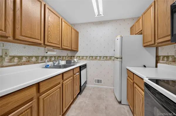 54 School ST #104, Westbury, NY 11590