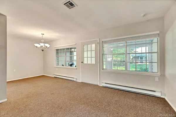 164 Falmouth CT #E, Ridge, NY 11961