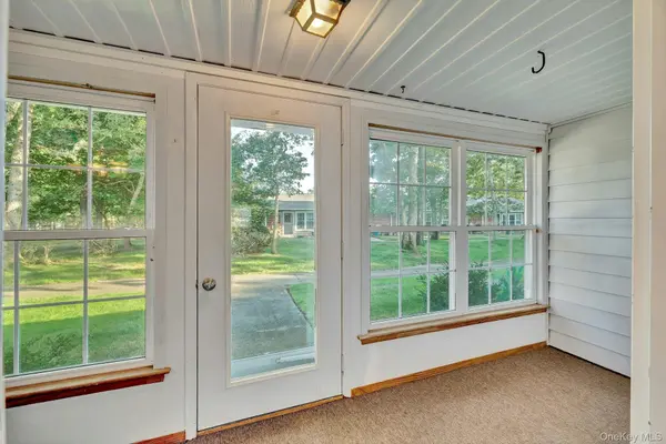 164 Falmouth CT #E, Ridge, NY 11961