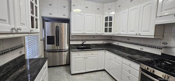 9317 123rd ST, Richmond Hill, NY 11419