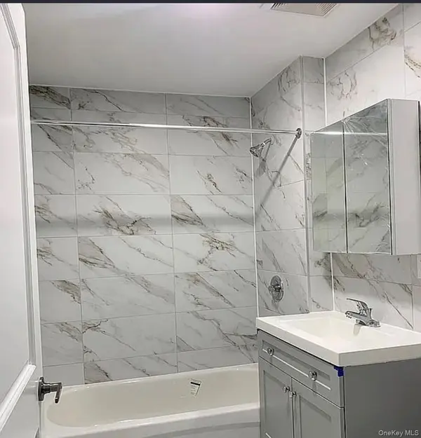 10211 37th AVE, Corona, NY 11368