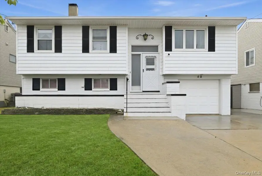 48 E 1st ST, Freeport, NY 11520