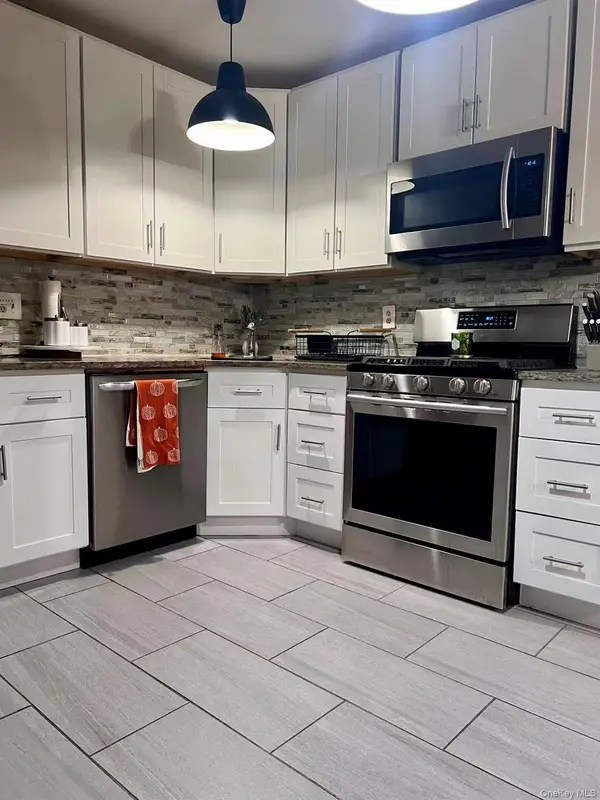 7703 58th AVE, Middle Village, NY 11379
