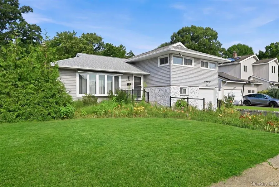 658 Richmond RD, East Meadow, NY 11554