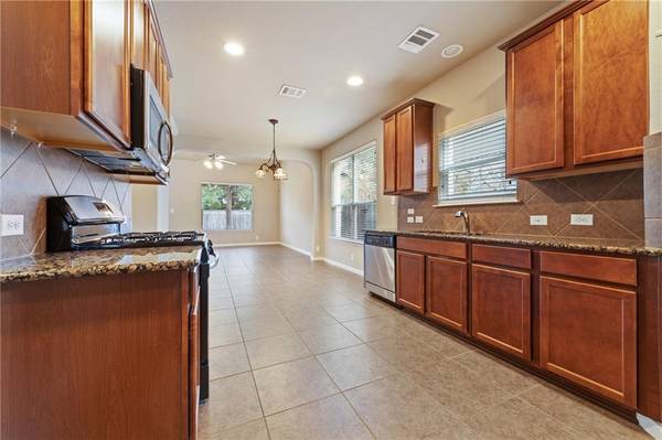 11411 Buster Crabbe DR, Austin, TX 78748