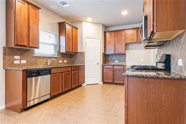 11411 Buster Crabbe DR, Austin, TX 78748