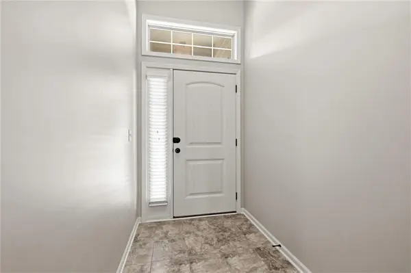 308 E Olive ST, Raymore, MO 64083