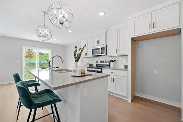 707 Glenn CIR, Raymore, MO 64083