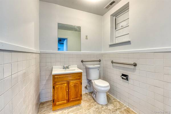 153 Woodbury RD, Hicksville, NY 11801