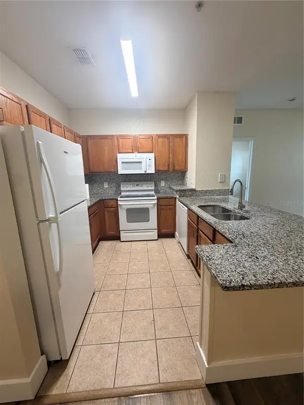 8137 CLAIRE ANN DR #207, Orlando, FL 32825