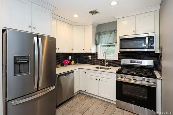 107 W Centennial AVE, Roosevelt, NY 11575