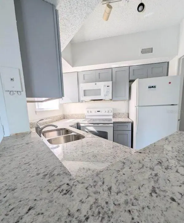 1956 LAKE ATRIUMS CIR #144, Orlando, FL 32839