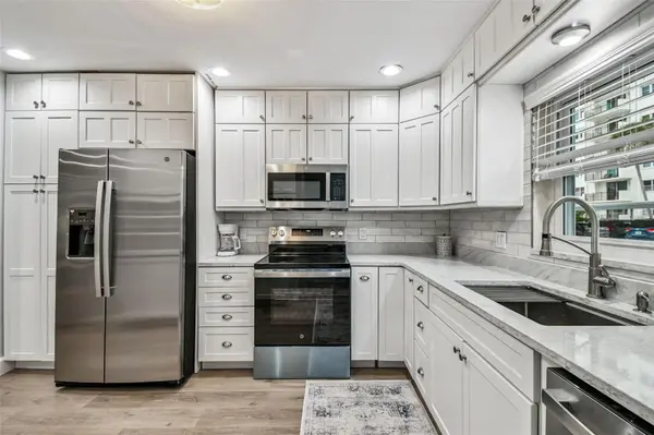 8 GLENCOE PL #107, Dunedin, FL 34698
