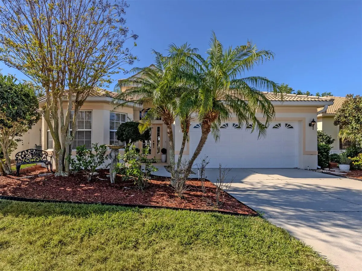404 PINEWOOD LAKE DR, Venice, FL 34285