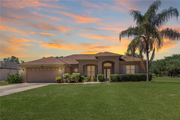 12929 REGIMENT DR, Grand Island, FL 32735