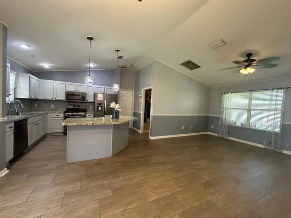 104 CHERRY BLOSSOM LN, Lady Lake, FL 32159
