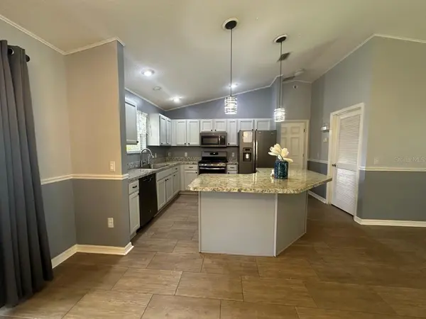 104 CHERRY BLOSSOM LN, Lady Lake, FL 32159