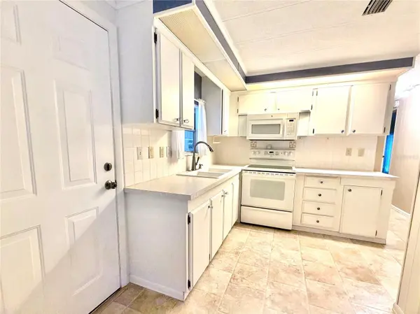 3335 S CITRUS CIR #GE, Zellwood, FL 32798