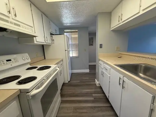 1656 SUNNY BROOK LN NE #L102, Palm Bay, FL 32905
