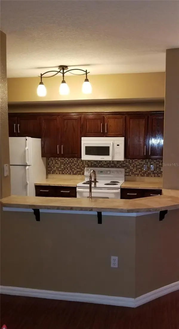 5542 METROWEST BLVD #106, Orlando, FL 32811