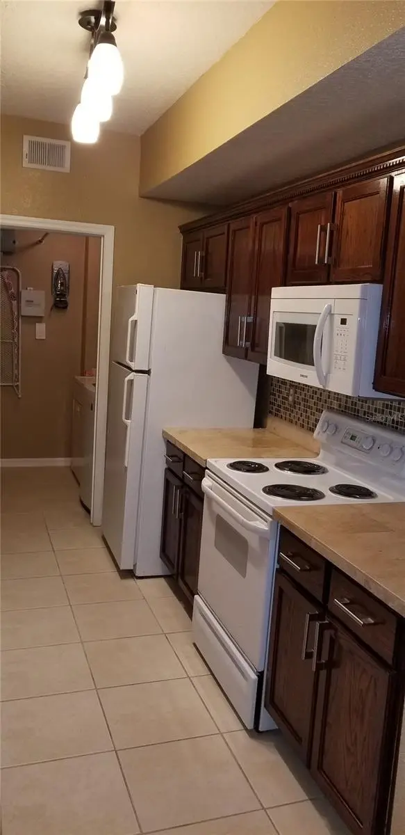 5542 METROWEST BLVD #106, Orlando, FL 32811