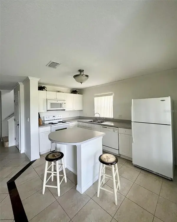 2884 CLUB CORTILE CIR, Kissimmee, FL 34746