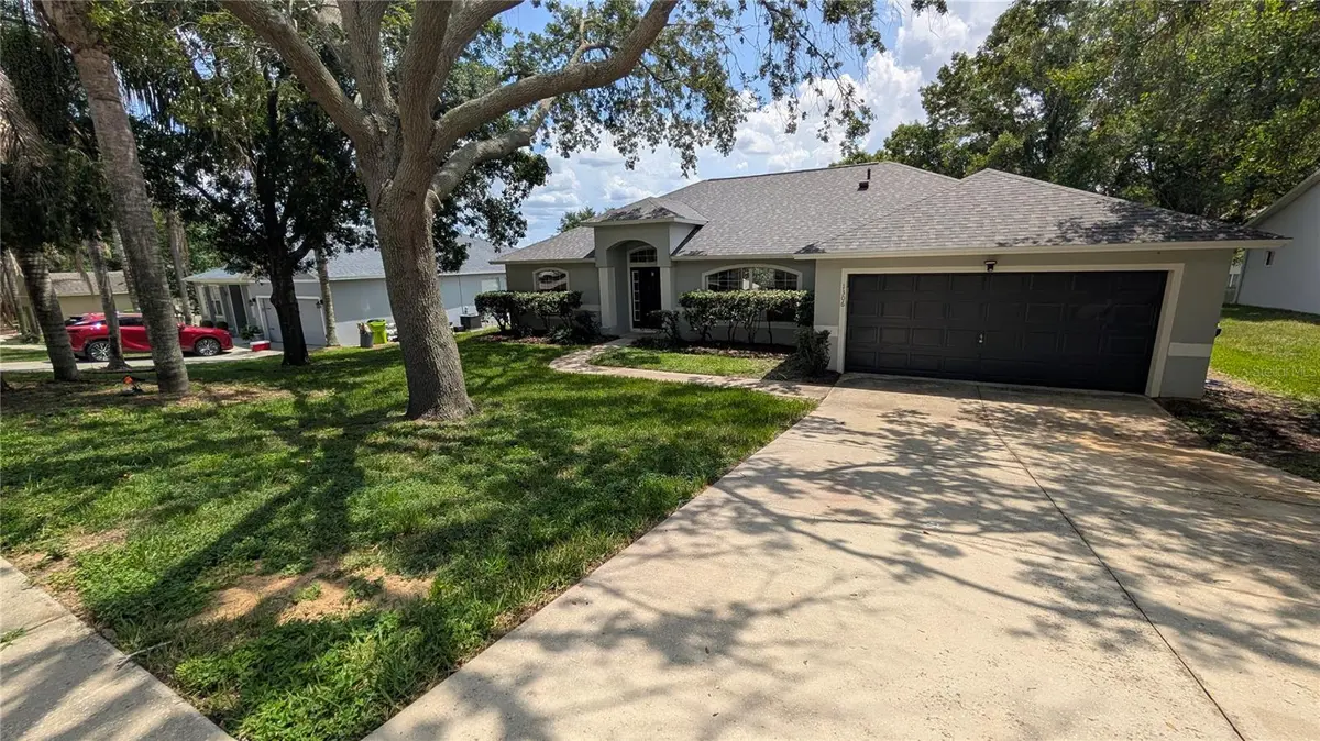 1306 WINDY BLUFF DR, Minneola, FL 34715