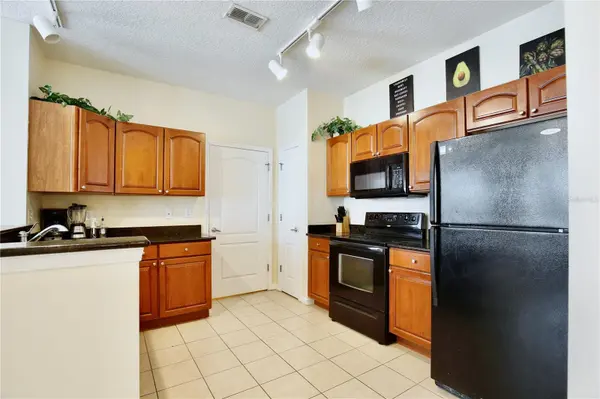 5255 CANE ISLAND LOOP #204, Kissimmee, FL 34746