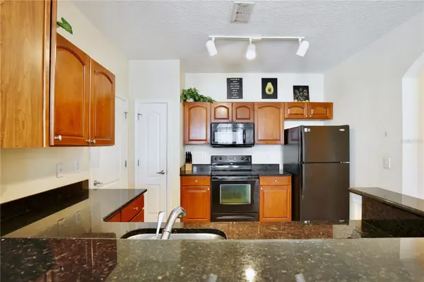 5255 CANE ISLAND LOOP #204, Kissimmee, FL 34746