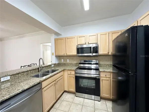 12843 MADISON POINTE CIR E #201, Orlando, FL 32821